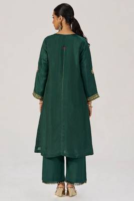 Deep emerald green festive silk kurta set 1
