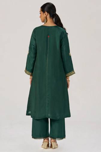 Deep emerald green festive silk kurta set