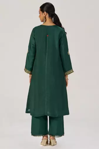 Deep emerald green festive silk kurta set