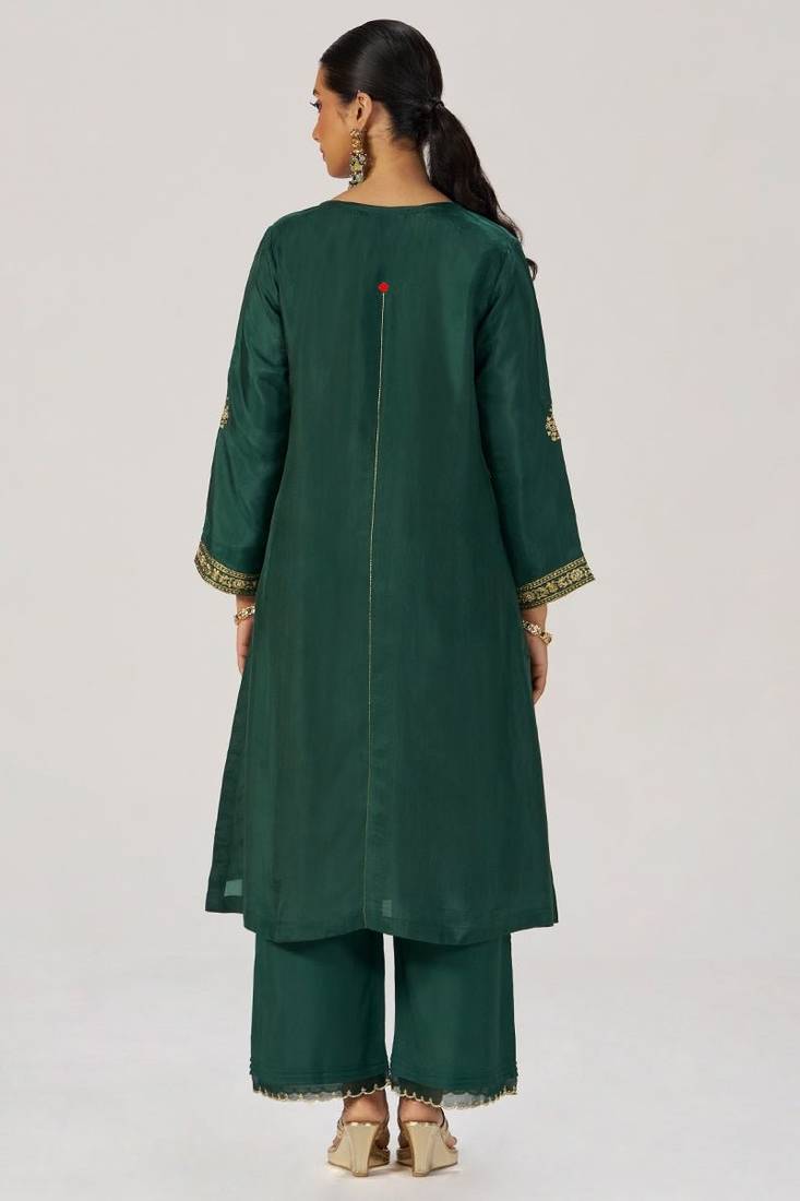 Deep emerald green festive silk kurta set