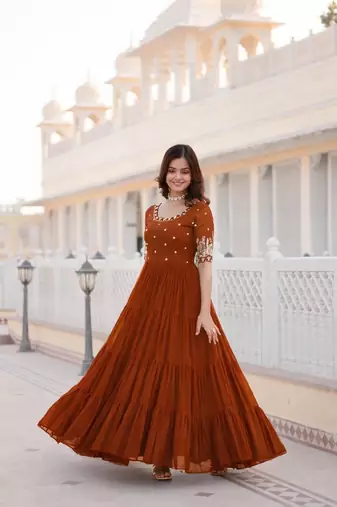Rust embroidered georgette fully stitched flared anarkali gown