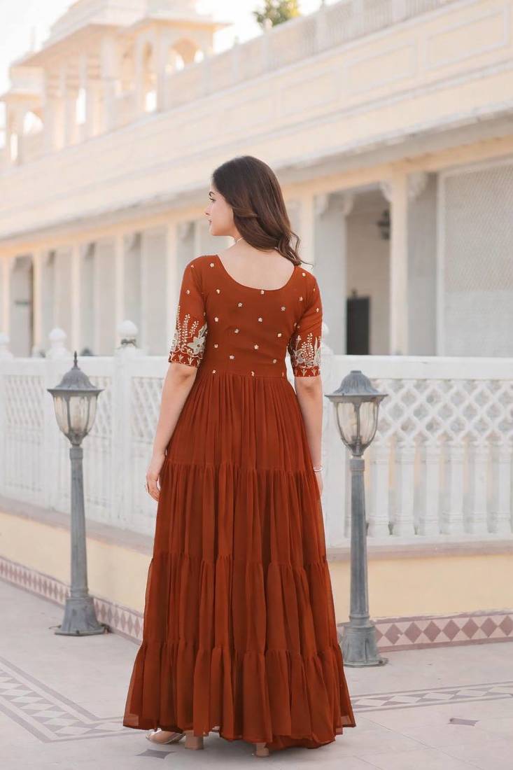 Rust embroidered georgette fully stitched flared anarkali gown