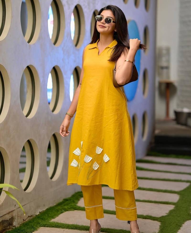 Yellow floral printed pure cotton sleeveless kurta trouser set for women