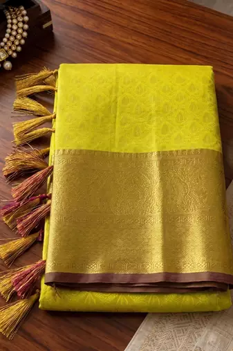 green silk blend kanchipuram silk woven saree