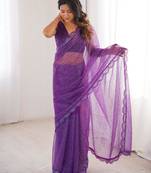 Purple net thread work embroidered saree
