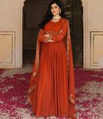 Elegant rust georgette gown with embroidered dupatta