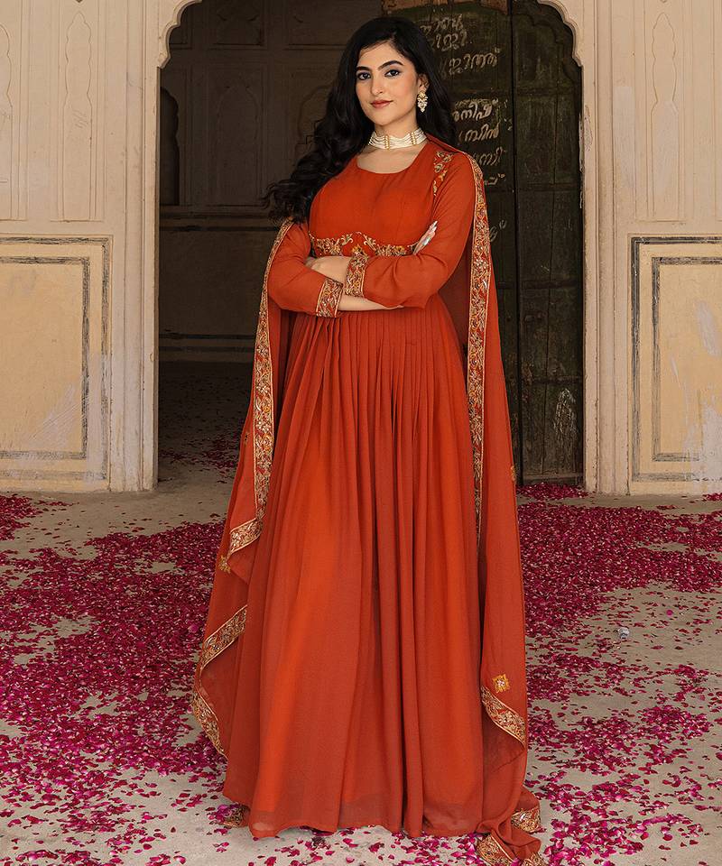 Elegant rust georgette gown with embroidered dupatta