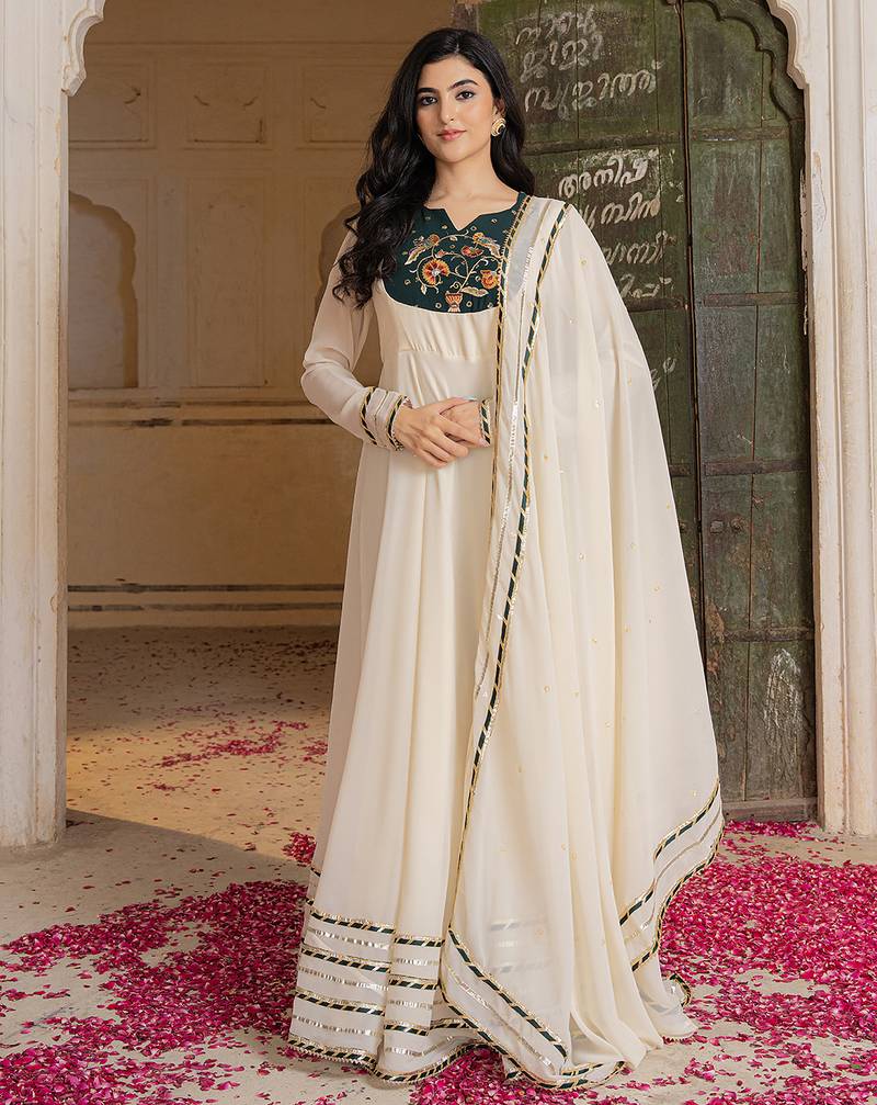 Elegant off white anarkali suit with matching embroidered dupatta
