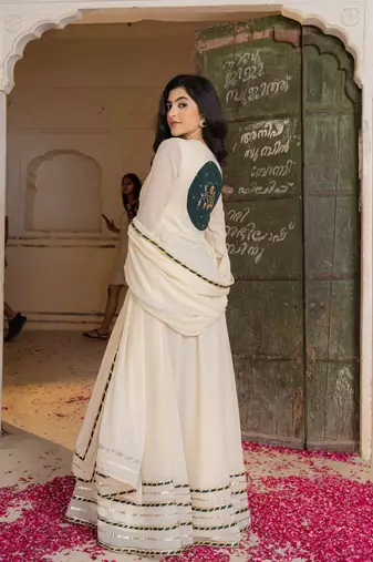 Elegant off white anarkali suit with matching embroidered dupatta