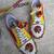Pink and yellow printed artificial leather sneakers