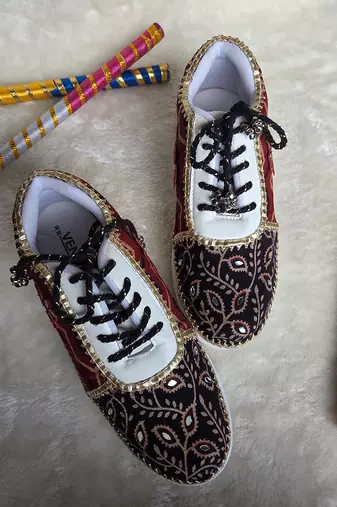 Red and black printed artificial leather sneakers