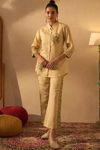 Yellow silk blend floral embroidered thread work embellished puff sleeves shirt with trousers