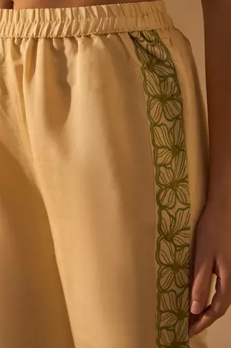 Yellow silk blend floral embroidered thread work embellished puff sleeves shirt with trousers