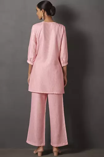 Pink embroidered v neck top with trousers co-ords