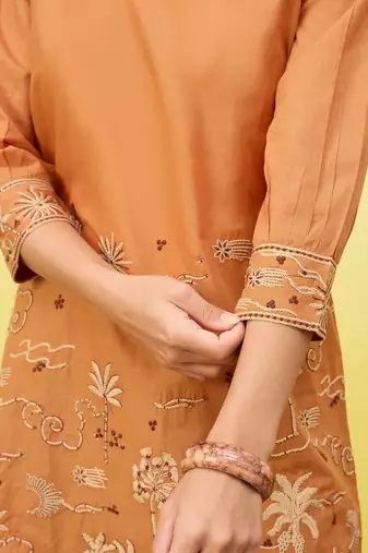 Orange women ethnic motifs embroidered thread work kurta