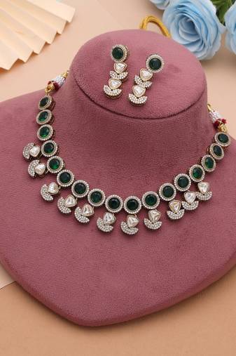 Lush emerald green color american diamond navratna polki necklace set for festive occasions