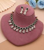 Lush emerald green color american diamond navratna polki necklace set for festive occasions