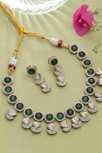 Lush emerald green color american diamond navratna polki necklace set for festive occasions