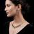 Sparkling emerald green color american diamond necklace set for festive celebrations