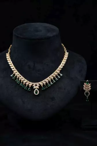 Sparkling emerald green color american diamond necklace set for festive celebrations
