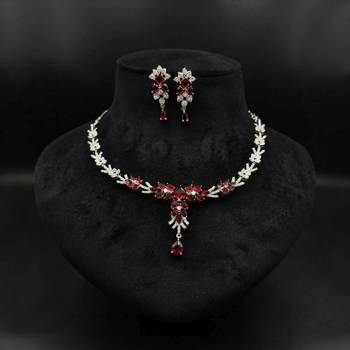 Striking blood red color american diamond necklace set for grand bridal attire 1
