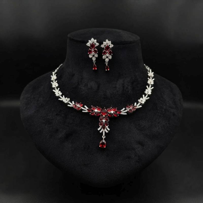 Striking blood red color american diamond necklace set for grand bridal attire