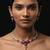 Striking blood red color american diamond necklace set for grand bridal attire