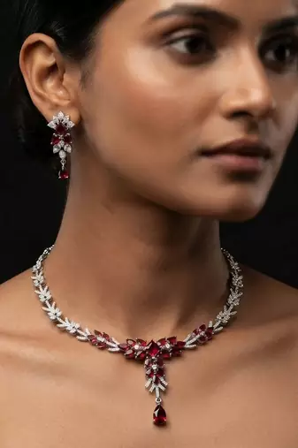 Striking blood red color american diamond necklace set for grand bridal attire