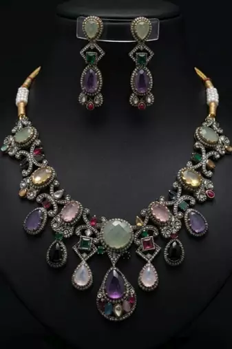 Heavy bridal multi color sabyasachi inspired russian stone necklace set for celebrations