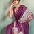 Purple color linen fabric graceful festive looks fancy saree