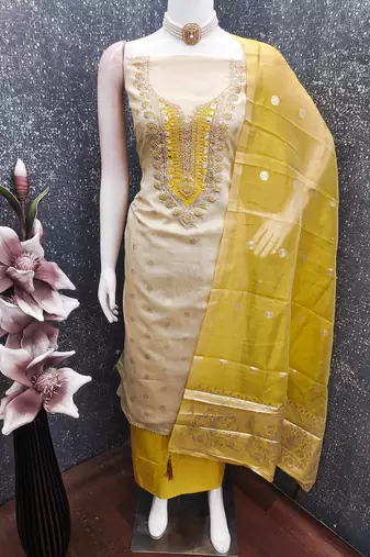 beige & contrast embroidered shimmer unstitched dress material with mirror work