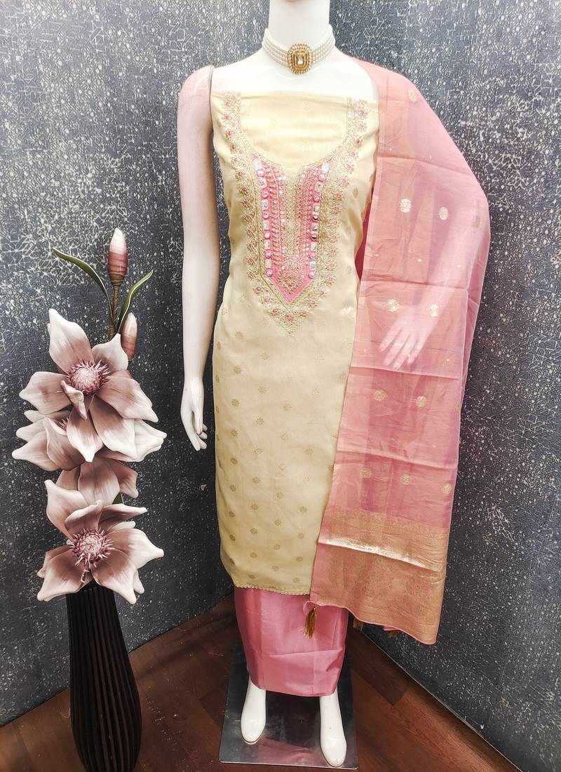  beige & contrast embroidered shimmer unstitched dress material with mirror work