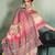 Cream color linen fabric graceful festive looks fancy saree