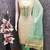 beige & contrast embroidered shimmer unstitched dress material with mirror work