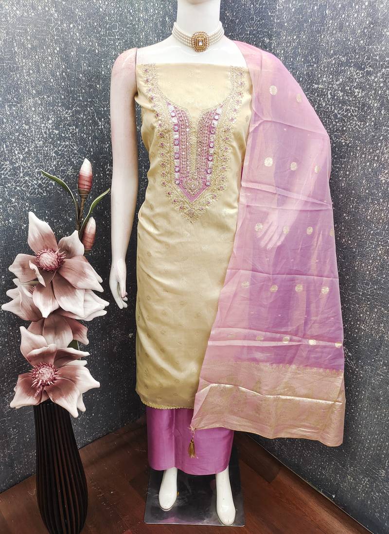  beige & contrast embroidered shimmer unstitched dress material with mirror work