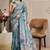 teal cotton blend zari weaving floral digital print festive saree with unstitched blouse piece