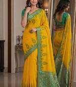 Yellow soft silk blend banarasi jacuard work festive saree with unstitched blouse piece