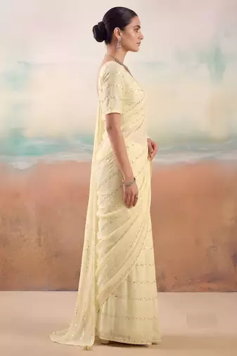 Cream color smart floral embroidered chiffon fabric graceful rich looks saree