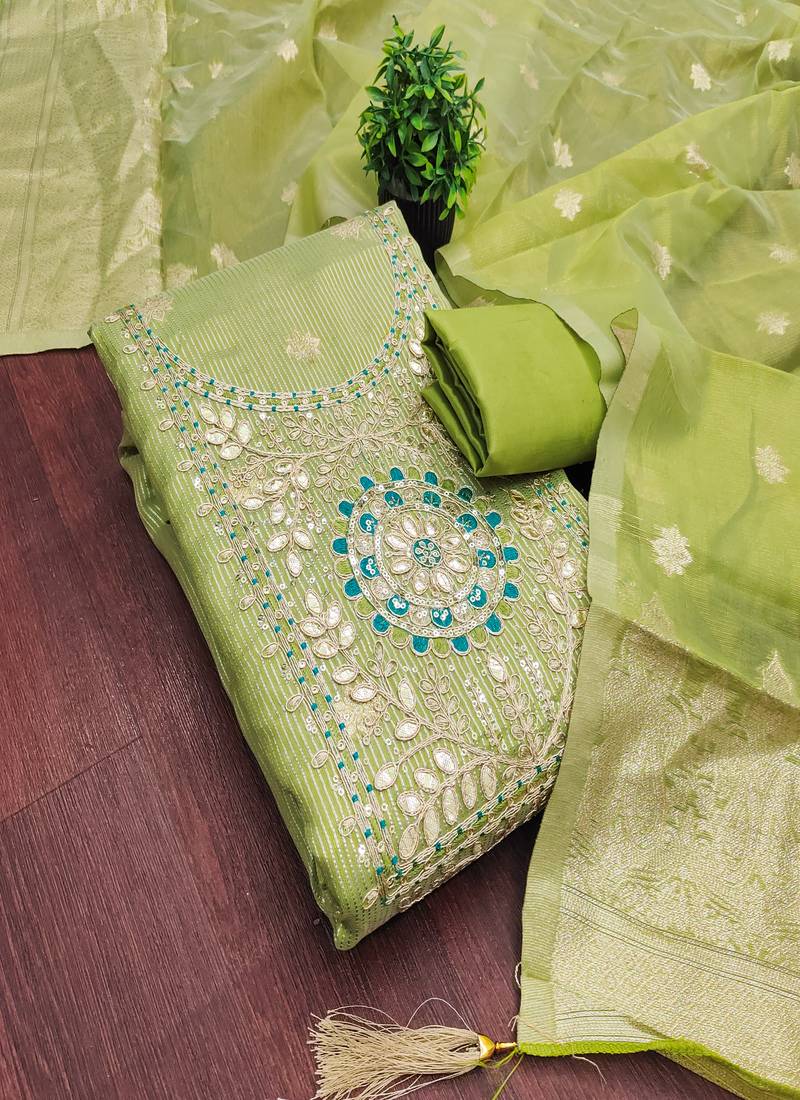  embroidered shimmer unstitched dress material with mirror work yoke
