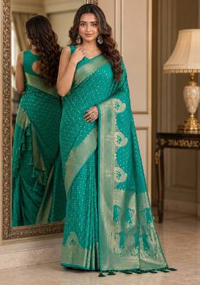 Teal green soft silk blend banarasi jacuard work festive saree with unstitched blouse piece 1