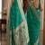 Teal green soft silk blend banarasi jacuard work festive saree with unstitched blouse piece