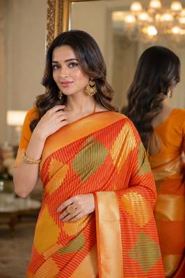 Orange soft silk blend banarasi jacuard work festive saree with unstitched blouse piece 2