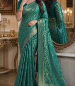Teal green soft silk blend banarasi jacuard work festive saree with unstitched blouse piece