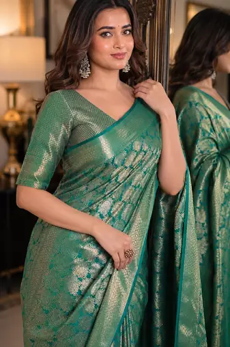 Teal green soft silk blend banarasi jacuard work festive saree with unstitched blouse piece