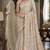 Off white red soft silk blend banarasi jacuard work festive saree with unstitched blouse piece