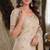 Off white red soft silk blend banarasi jacuard work festive saree with unstitched blouse piece