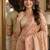 Cream soft silk blend banarasi jacuard work festive saree with unstitched blouse piece