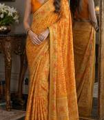 Yellow orange soft silk blend banarasi jacuard work festive saree with unstitched blouse piece