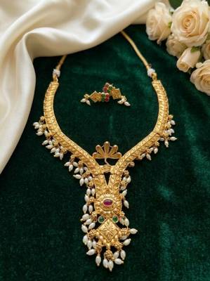 gold plated pearl necklace set with ruby and emerald accents 2