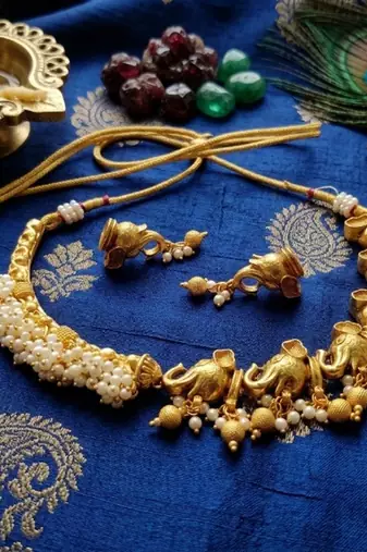 antique gold elephant temple choker necklace set with pearls